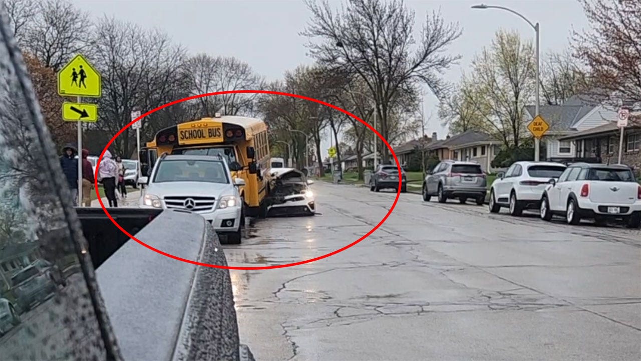 Car slams into school bus outside Milwaukee middle school