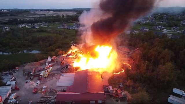 Flames contained in Slinger building fire; smoke will remain for days