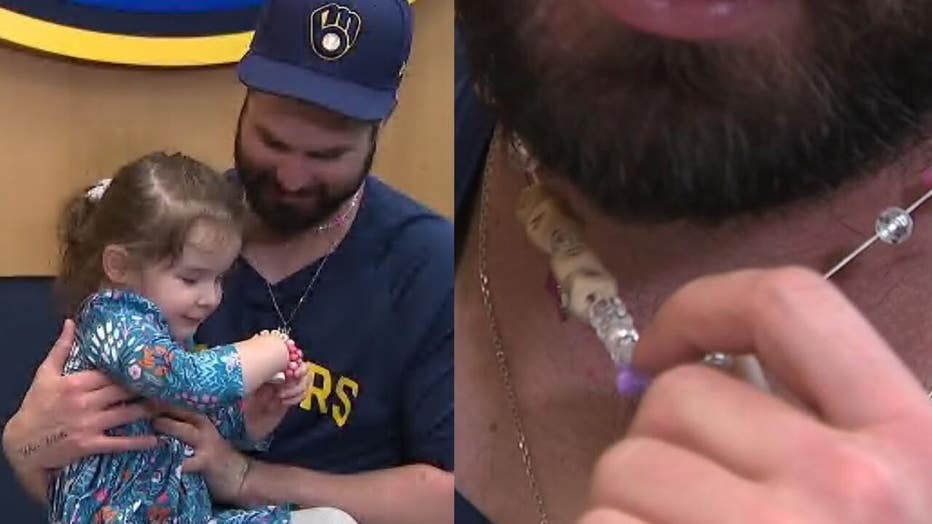 Jesse Winker reps a necklace made by his daughter 💛