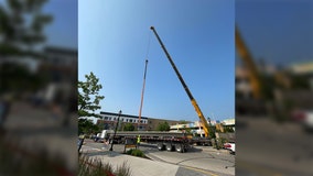 Bayshore parking garage collapse; crane, heavy equipment stationed