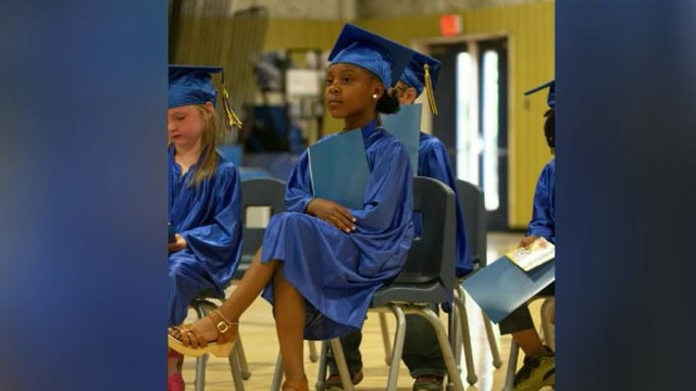 6-year-old girl goes viral for showing poise in school photo
