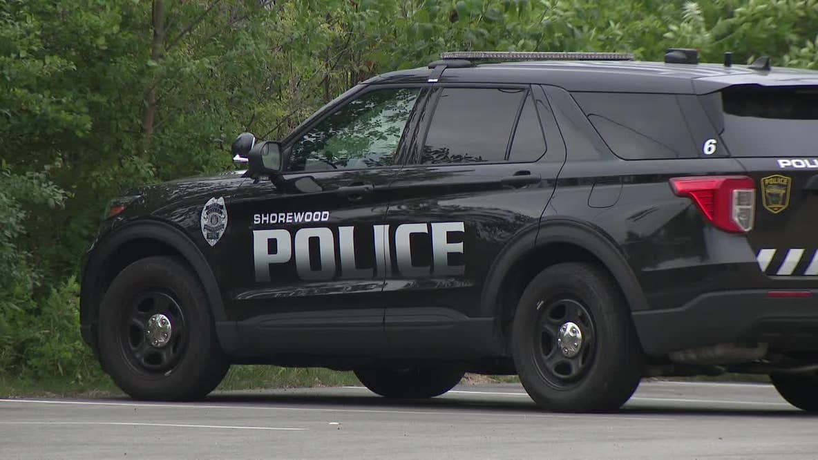Shorewood police chase; 2 in custody after crash, driver sought