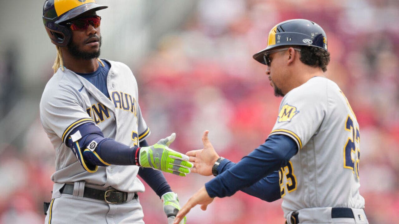 Brewers rally from three-run deficit after four innings to beat Reds