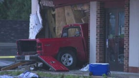 Truck crashes into Kenosha building; 2 dead, 3 hurt