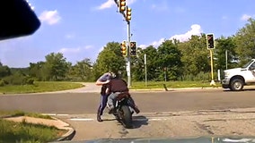 Watch: Motorcyclist pushes Massachusetts trooper into oncoming traffic