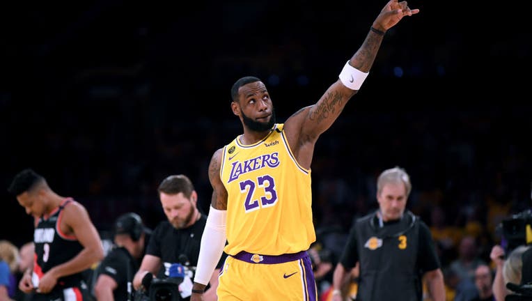 LeBron James changing uniform number back to 23: report