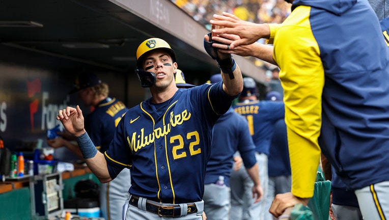 WATCH: Milwaukee Brewers' Carlos Santana and Christian Yelich