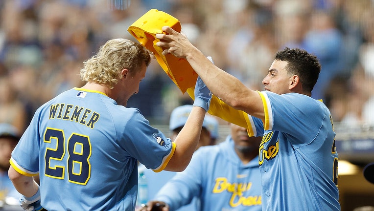 Abbott allows 1 hit in six innings of his MLB debut as Reds beat Brewers 2-0