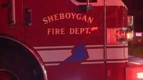 Sheboygan house fire, smoke pours from basement of structure