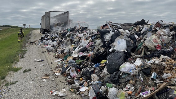 Beaver Dam garbage fire, semi-trailer contents dumped on roadway