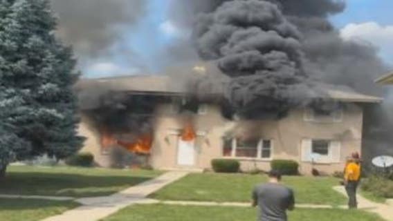 Greenfield apartment fire, tenants rescued, firefighter hurt