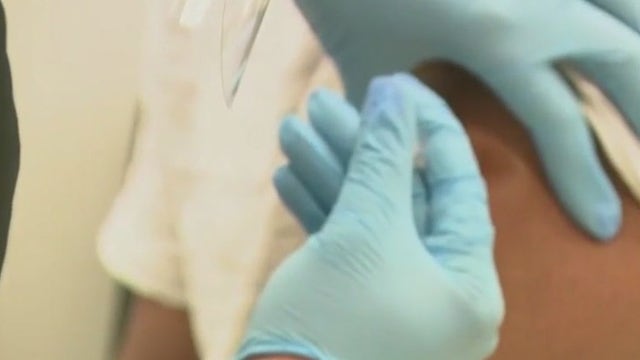 Updated COVID vaccines coming in September: report