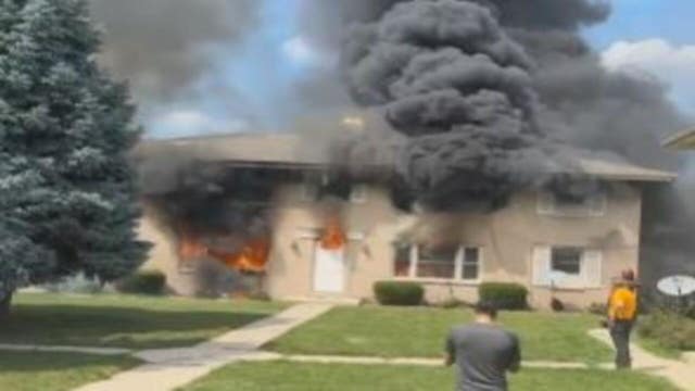 Greenfield apartment fire, tenants rescued, firefighter hurt