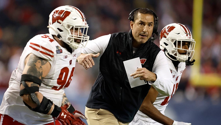 Wisconsin football coach Luke Fickell tells students to arrive on time