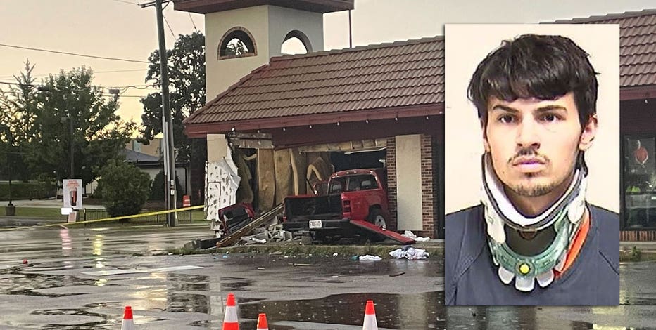 Truck crash into Kenosha building, driver allegedly intoxicated