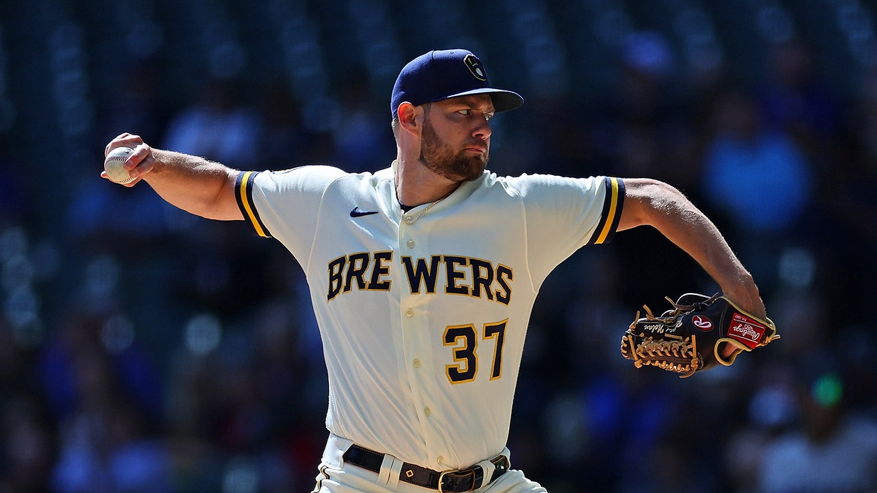 Taylor homers, Houser pitches NL Central champion Brewers past