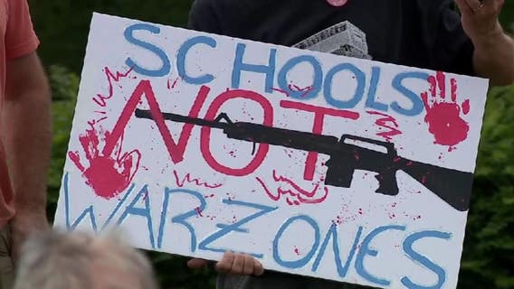 Milwaukee rally seeks gun safety bill hearings in Madison