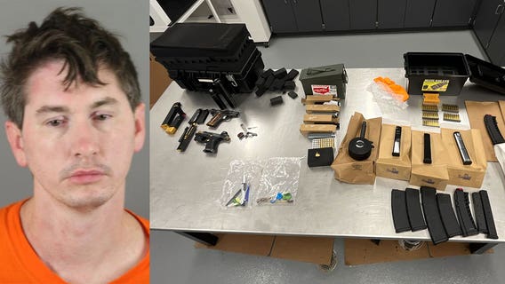 Waukesha man accused; guns, drug charges after rollover crash