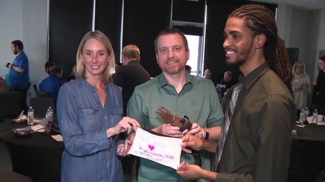 Prosthetic hand building activity, Milwaukee-area workers take part