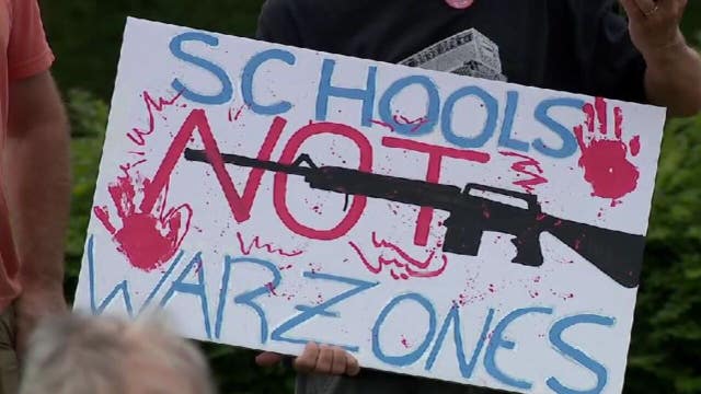 Milwaukee rally seeks gun safety bill hearings in Madison