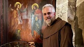 American priest escapes war in Holy Land, now safe at Holy Hill