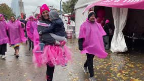 Making Strides Against Breast Cancer; walkers uplifted despite rain, wind