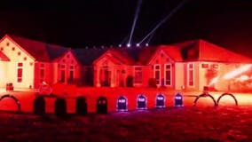 Home transformed into Halloween light, fire display