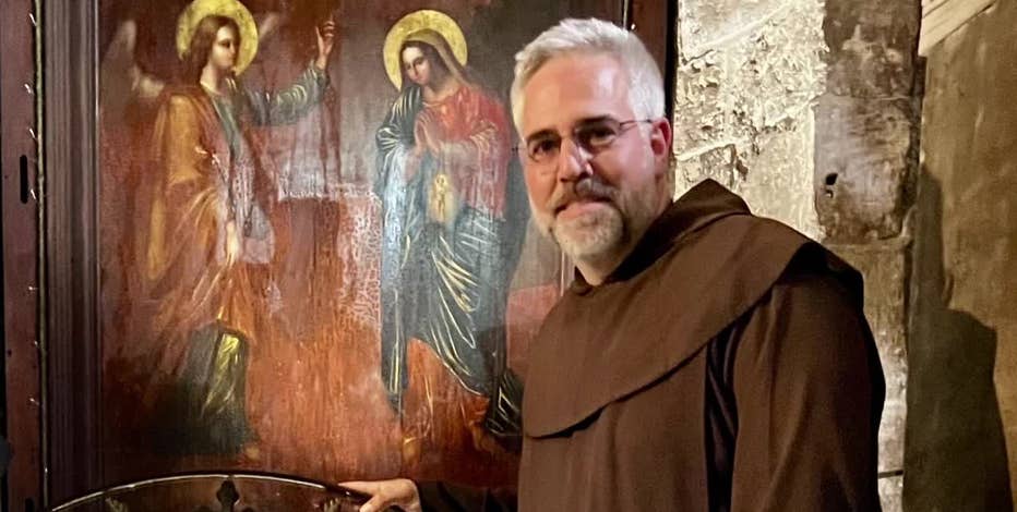 American priest escapes war in Holy Land, now safe at Holy Hill