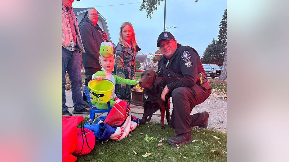Racine trickortreat parade; officers brighten day of boy with leukemia