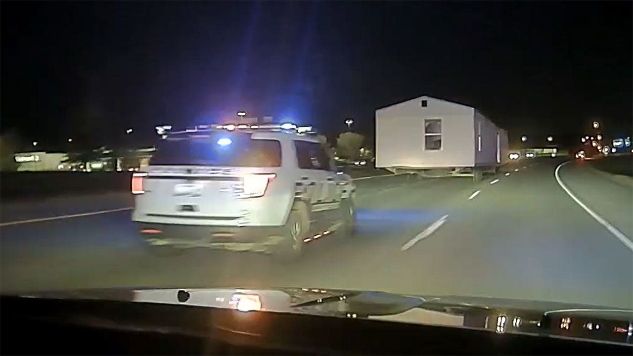 Missouri police chase of house being pulled by truck: caught on cam
