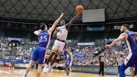 No. 4 Marquette routed No. 1 Kansas 73-59 in testy Maui semifinal