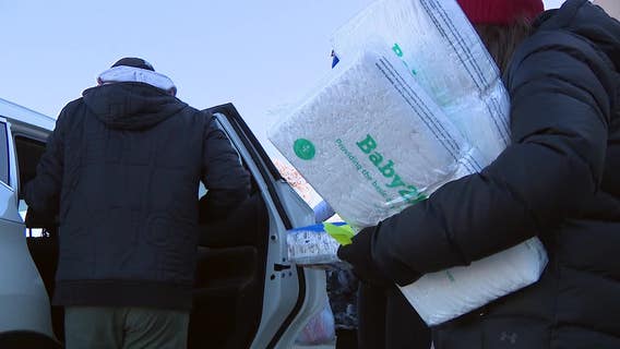 Giannis and family volunteer at Milwaukee Diaper Mission