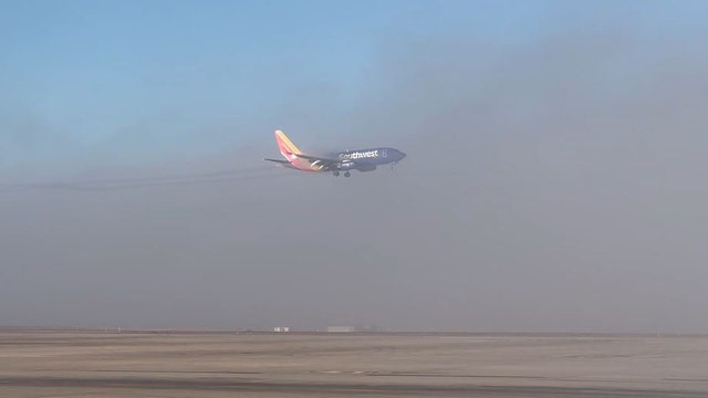 Watch: Southwest jet aborts landing in Denver after entering patch of dense fog