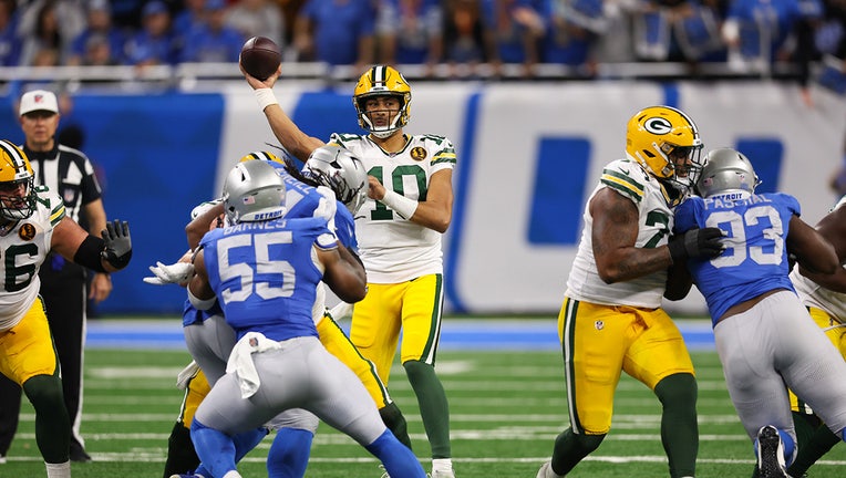 Packers Edge Lions On Thanksgiving, Love Tosses 3 TDs