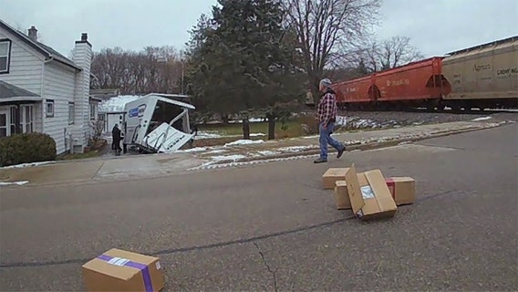 Train, truck collide in Slinger; police cite driver