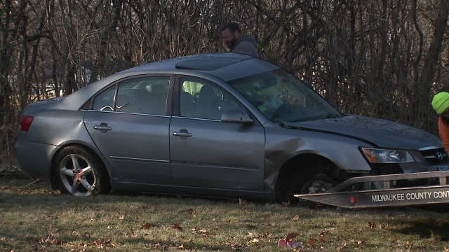 Milwaukee fatal crash; Sherman and Custer, vehicle in trees