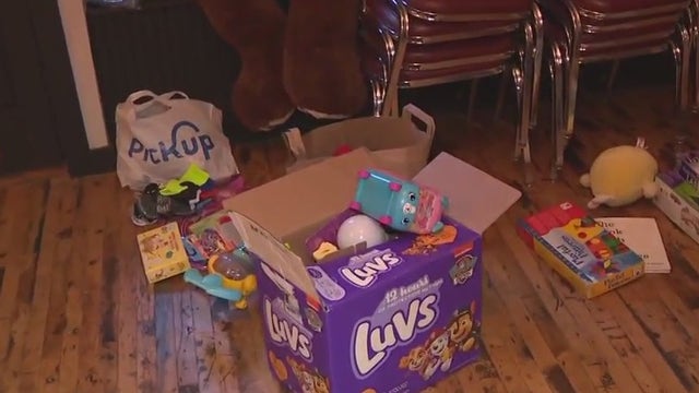 Girl Scouts give back; pop-up toy, clothing drive