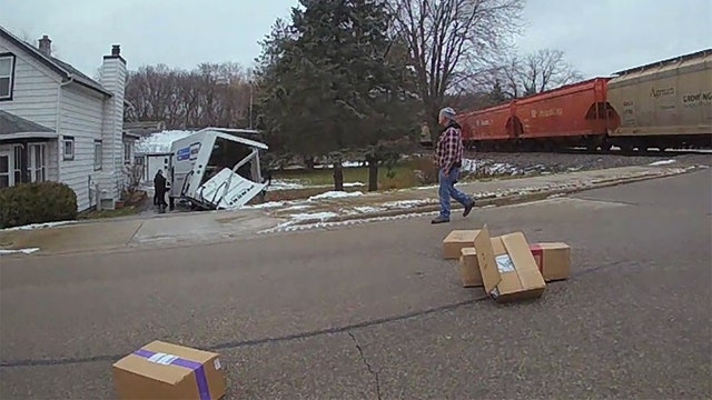 Train, truck collide in Slinger; police cite driver