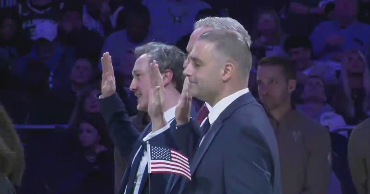 Bryce Ripp WI State Trooper becomes US citizen during halftime at Bucks game ...