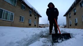 Milwaukee boy shoveling snow, business effort with big goal