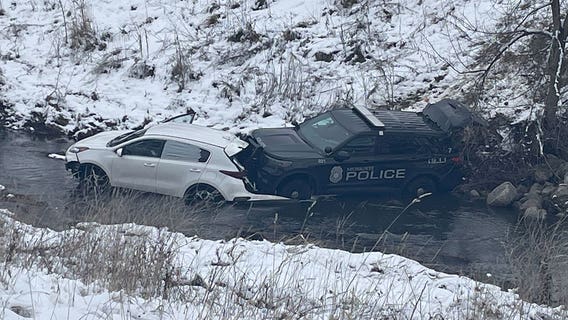 Milwaukee squad, SUV in creek after police chase; 2 in custody