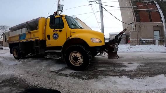 Milwaukee snow-clearing operation; warmer temps will help process