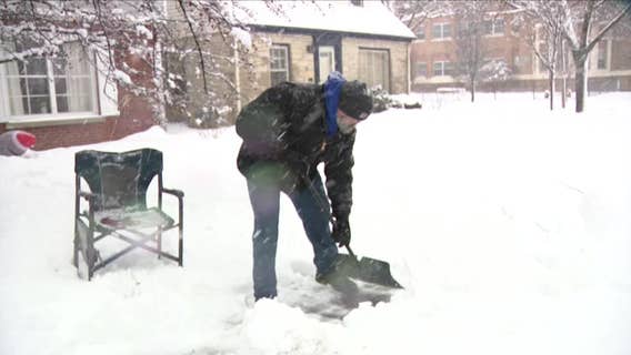 Wisconsin snowstorm; proper shoveling technique from powerlifter