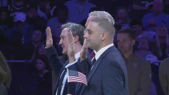WI State Trooper becomes US citizen during halftime at Bucks game