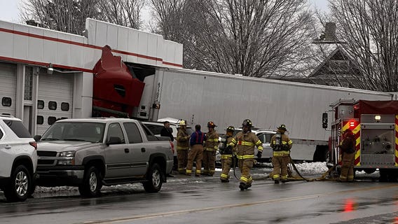 Semi crashes into Elkhart Lake business; vehicle also struck, 3 hurt