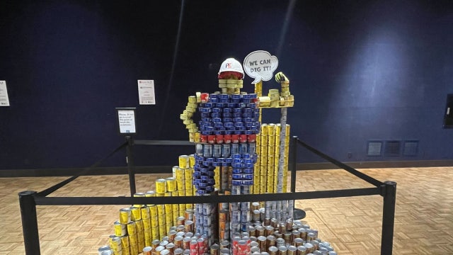 Canned food art at Milwaukee Public Museum, benefits food pantry