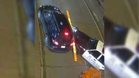 Milwaukee police officers hurt, car drove through barricade: video