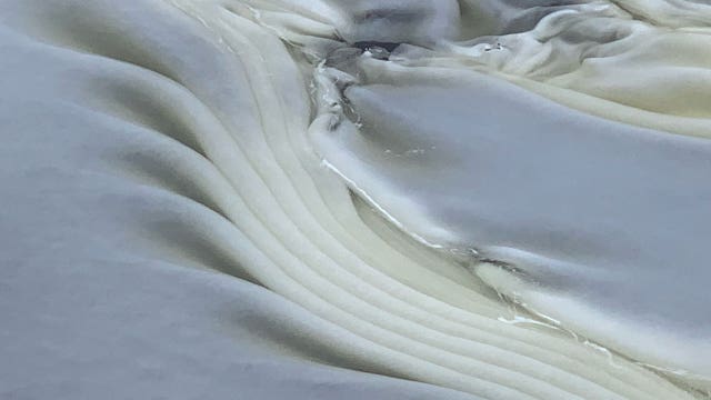 Milwaukee River strange ice formation seen near West Bend