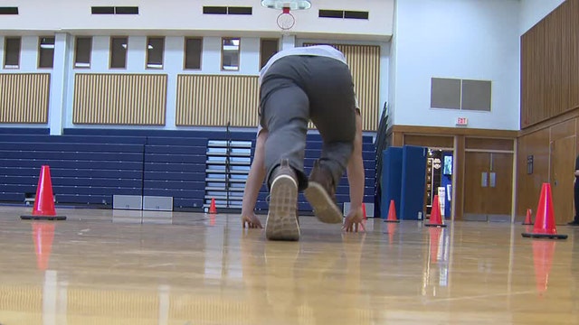 Milwaukee police officer hiring event, attendees learn about career