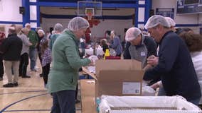 New Berlin volunteers pack 50,000 meals for families